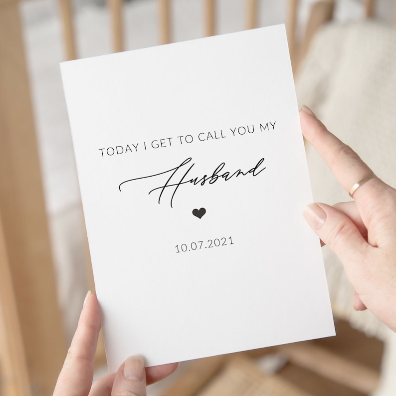 May include: A white card with black text that reads "Today I get to call you my Husband" with a small heart symbol and the date "10.07.2021".
