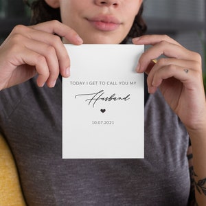 May include: White card with black text that reads "Today I get to call you my Husband" with a small black heart and the date "10.07.2021" below.