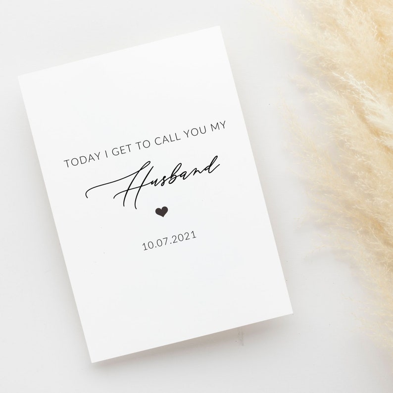 May include: A white card with black text that reads "Today I get to call you my Husband" with a small black heart and the date "10.07.2021" printed below.
