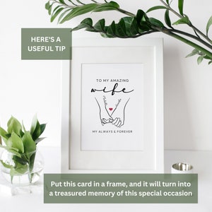 May include: A black and white printable art print with a hand-drawn illustration of two hands holding each other with a red heart in the center. The text "To my amazing wife" is at the top of the print, and the names "Michelle" and "Brenda" are written on the hands. The text "My always & forever" is at the bottom of the print.
