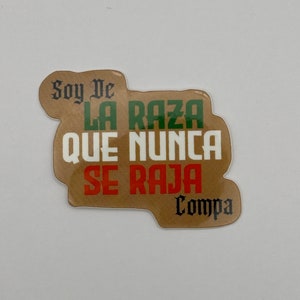 May include: A brown sticker with the text "Soy De La Raza Que Nunca Se Raja" in black, green, white, and red lettering. The text "Compa" is in black lettering at the bottom of the sticker.