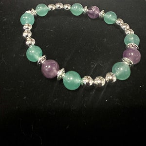 Amethyst and aventurine beaded bracelet with silver accent beads.