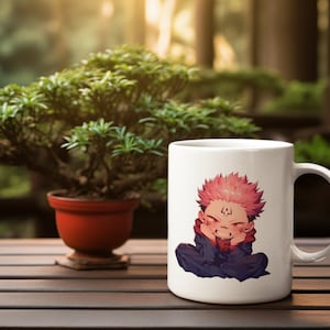 May include: White ceramic mug with a cartoon illustration of a pink-haired character with a black and red outfit. The character is sitting with their hands on their cheeks and smiling.