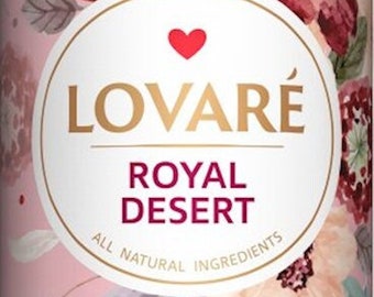 May include: A cylindrical tea container with a pink and floral design. The container features the text "LOVARÉ ROYAL DESERT" and "floral-berry tea blend". The design includes watercolor-style flowers and cherries.