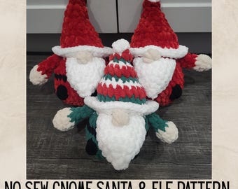 May include: Three plush gnomes with white beards and red hats. Two gnomes have red bodies with black accents, while the third has a green and white body. The text "NO SEW GNOME SANTA & ELF PATTERN" is at the bottom.