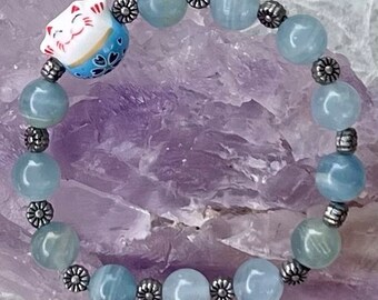 Throat/5th Chakra (Vishuddha) Blue Argentina Lemurian Calcite Bracelet With Metal Flower Spacer Beads/Stretchy/Size M