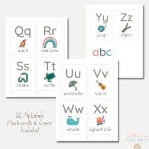 May include: 26 alphabet flashcards with illustrations for each letter. The flashcards are printed on white cardstock with a grey border. The illustrations include a quail, rainbow, snake, turtle, umbrella, violin, whale, and xylophone.