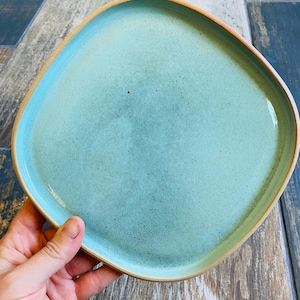 Flat ceramic plate in the shape of pebbles with stoneware rim, small plate, tray, handmade pottery display, tableware