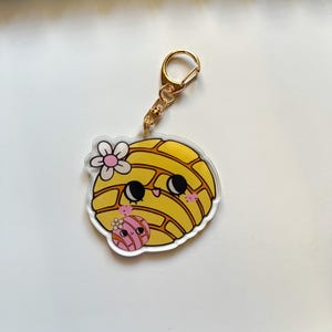 Acrylic yellow and pink Concha Bread Bag Charm and Keychain