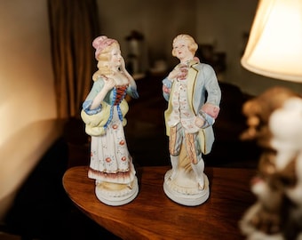 Vintage Bisque Porcelain Victorian Figurines - Stamped Japan - Repaired?