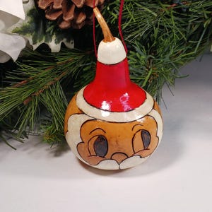 Hand Painted Gourd Santa Ornament – Vintage Signed Folk Art Christmas Decoration – Rustic Holiday Tree Accent – 4” Handmade Santa Face