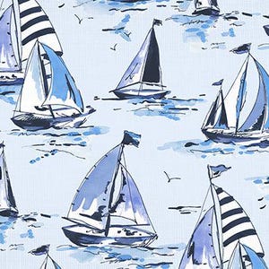 May include: Watercolor illustration of sailboats in shades of blue and white on a light blue background. The boats have various sail designs and are depicted on water with small bird accents, creating a nautical theme.