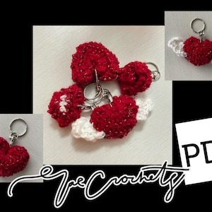 May include: Handmade crochet heart keyrings in red and white. Some hearts have white wings. The keyrings are attached to silver key rings. The image also includes the text "The Crochetz" and a "PDF" icon.