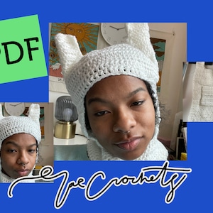 May include: A white crochet hat with bunny ears and a matching scarf. The hat and scarf are crocheted in a simple stitch. The hat has a pointed top and the scarf is long and flowing. The hat and scarf are shown on a person with dark skin.