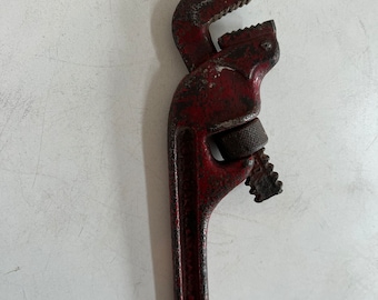 Old Red Metal Pipe Wrench