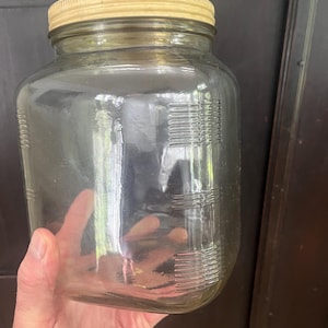 Vintage Glass Storage Jar with a Cream Lid