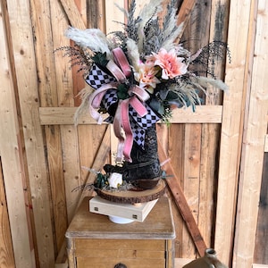 Boho southwestern cowgirl boot arrangement, Cowboy boot boho chic floral table decoration, Country western flower boot home wedding accent