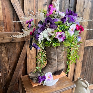 Boho southwestern cowgirl boot arrangement, Cowboy boot boho chic floral table decoration, Country western flower boot home wedding accent