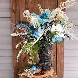 Boho southwestern cowgirl boot arrangement, Cowboy boot boho chic floral table decoration, Country western flower boot home wedding accent
