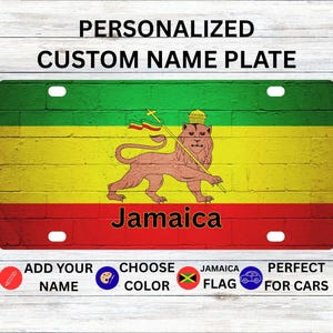 May include: A custom name plate with the Jamaican flag design. The plate features the colours green, yellow, and red, with a lion holding a staff. The word "Jamaica" is in red. The plate is rectangular with mounting holes.