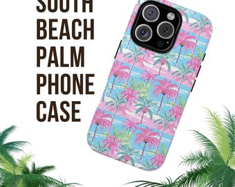 May include: A pink and blue phone case with a palm tree pattern. The case says "South Beach Palm Phone Case" on the back.