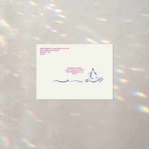 May include: A white envelope with a pink and blue address label. The address label reads "Jane Brown & Matthew Collins, 300 Harrison Avenue, Boston, MA 02104". The envelope also has a blue illustration of a bird carrying a small envelope.