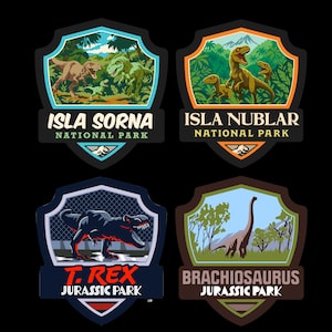 May include: Four shield-shaped stickers featuring dinosaur illustrations. Top left: Isla Sorna National Park with two T-Rexes. Top right: Isla Nublar National Park with three raptors. Bottom left: T. Rex Jurassic Park. Bottom right: Brachiosaurus Jurassic Park.