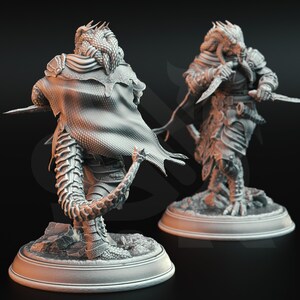 May include: A grey, detailed, 3D printed miniature of a humanoid figure with reptilian features, wearing armour and a cloak. The figure is holding a dagger in one hand and has a tail.