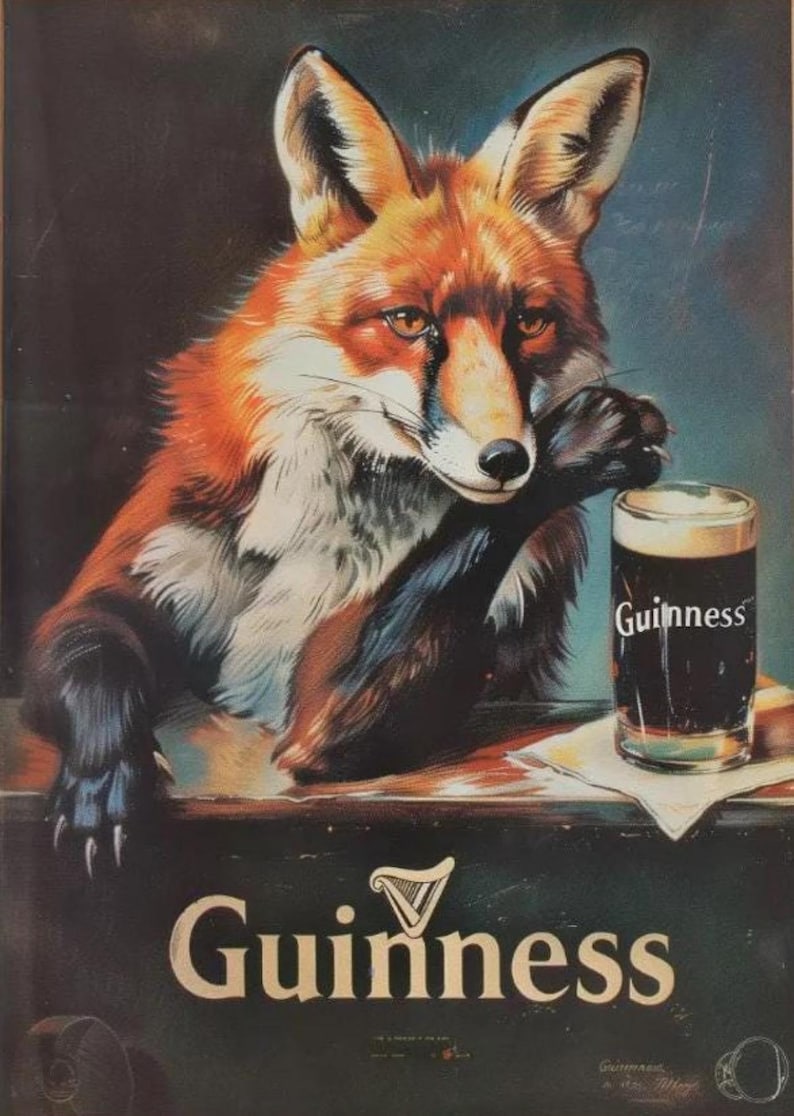May include: Vintage Guinness advertisement featuring a fox with orange and white fur, resting its paw on a table. A pint of Guinness stout sits on the table. The Guinness logo is displayed prominently.