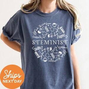 a woman wearing a t - shirt that says stemmist next day
