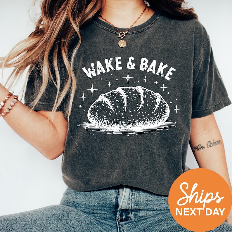 a woman wearing a wake and bake t - shirt