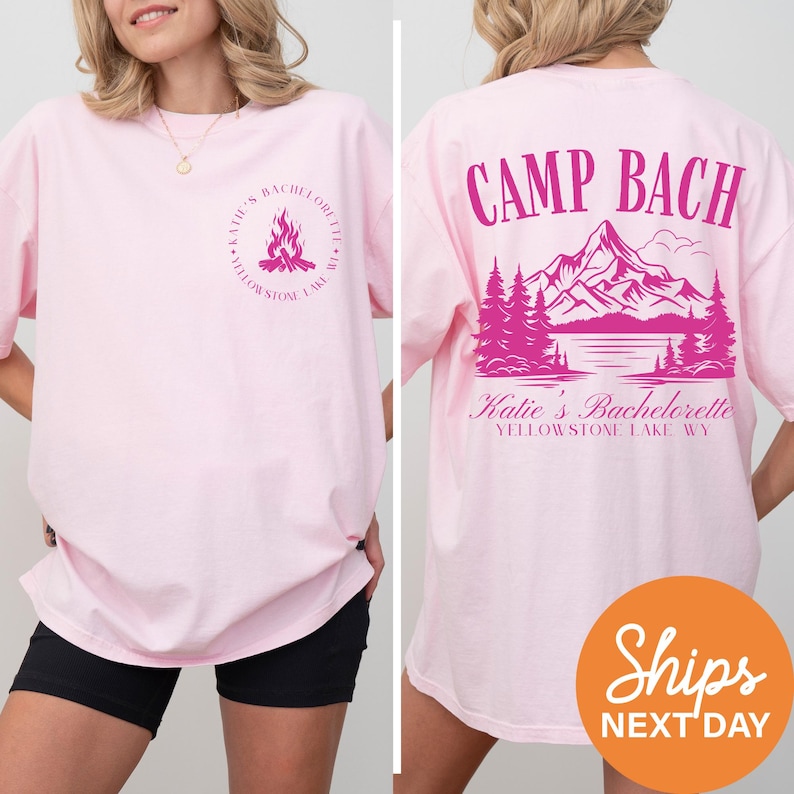 a woman wearing a pink shirt that says camp bach