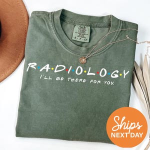 a green shirt that says radiology i'll get there for you