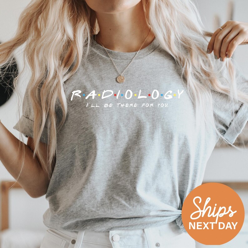 a woman wearing a radiology t - shirt with the words radiology on it