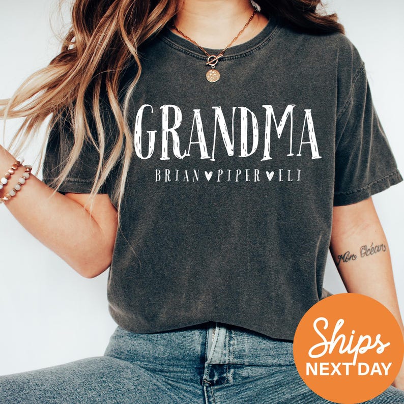 a woman wearing a shirt that says grandma