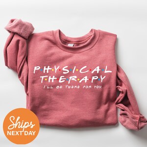 a pink shirt that says physical therapy i'll get there for you