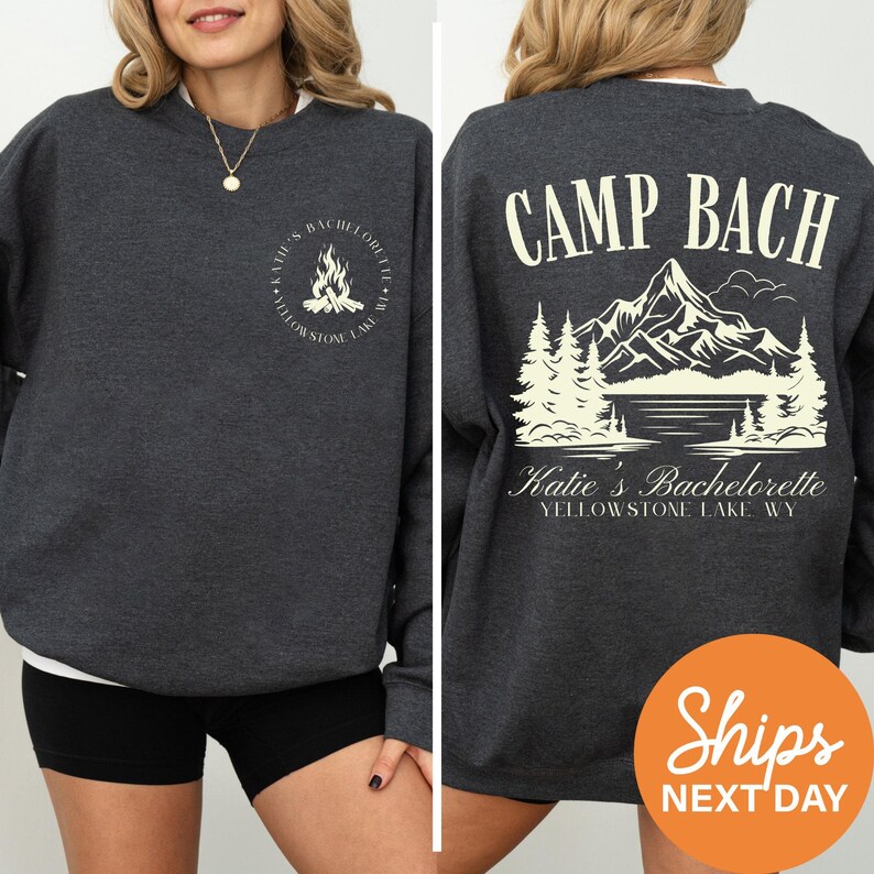 a woman wearing a black sweatshirt with camp bach on it