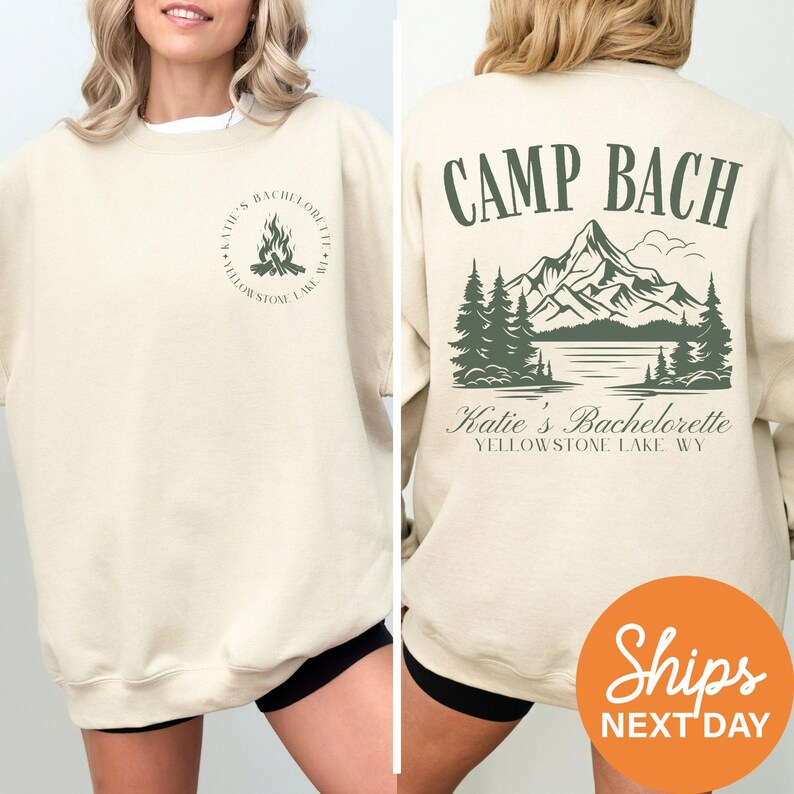 a woman wearing a sweatshirt that says camp bach