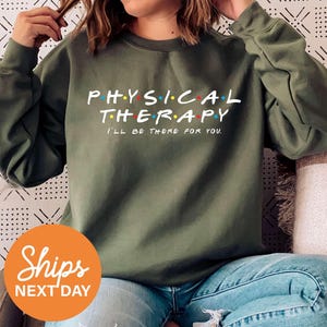 a woman wearing a sweatshirt that says physical therapy