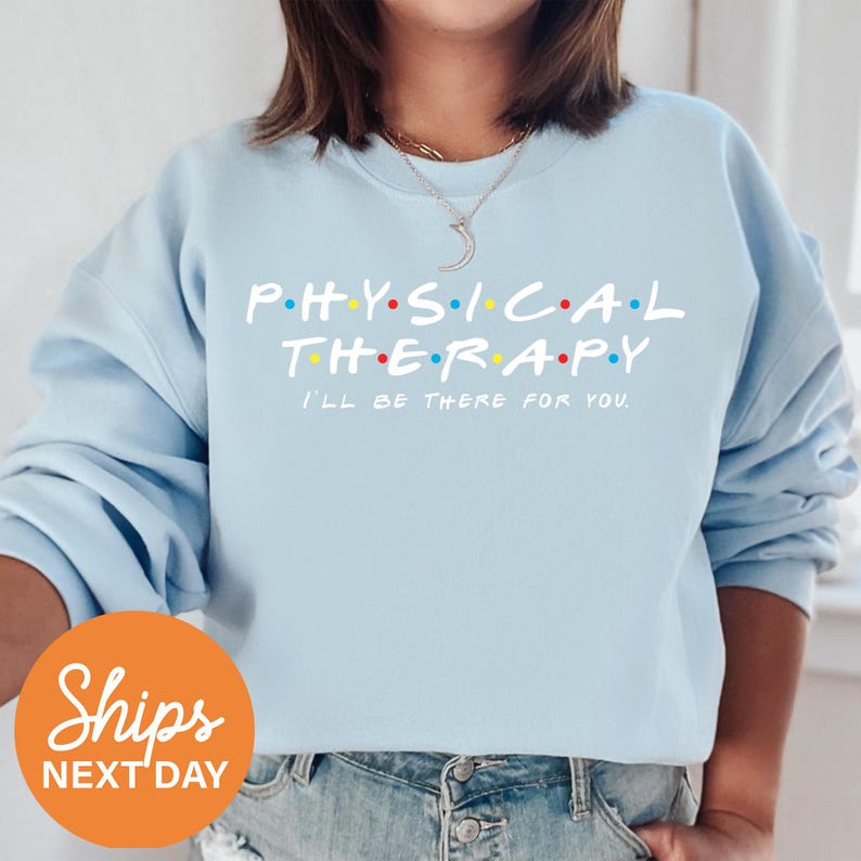a woman wearing a sweatshirt that says physical therapy i'll be there for you
