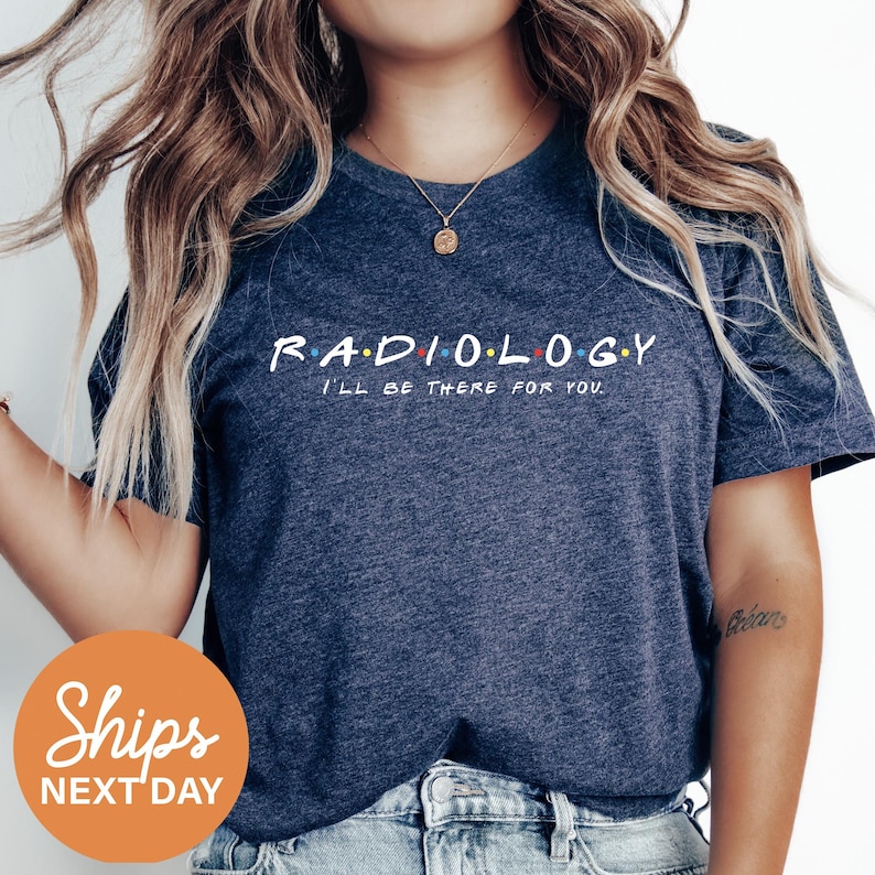 a woman wearing a radiology t - shirt with the words radiology on it