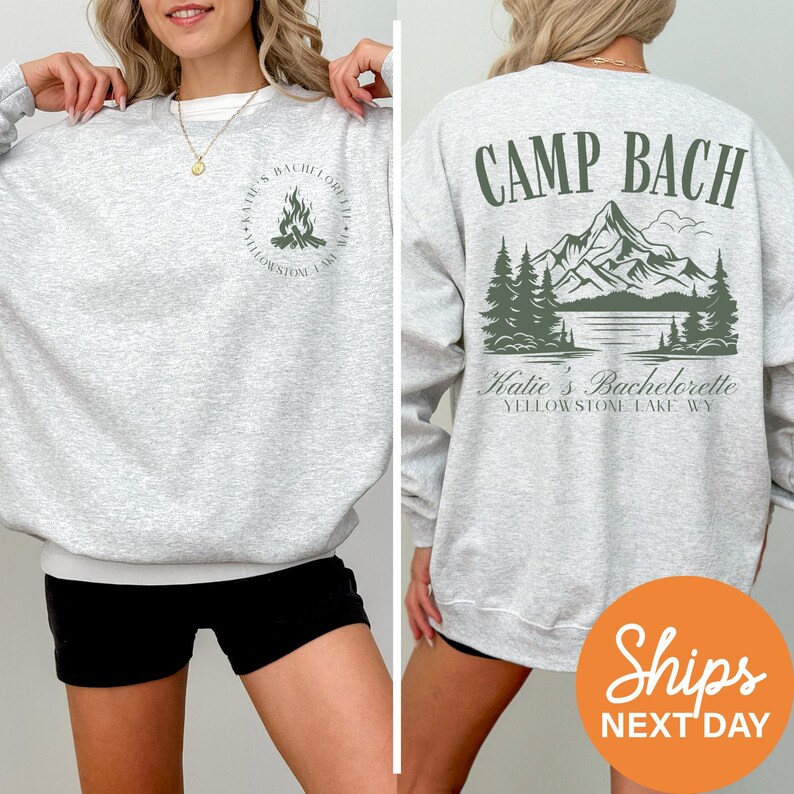 a woman wearing a sweatshirt that says camp bach