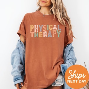 a woman wearing a brown shirt that says physical therapy