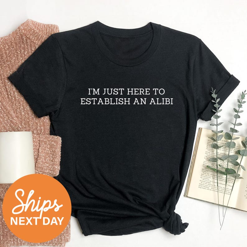 a t - shirt that says, i'm just here to established an ali