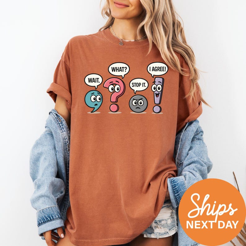 A woman wearing a t-shirt with four cartoon speech bubbles containing different phrases, such as "WAIT?", "I AGREE!", "STOP IT!", and "AGREE!".