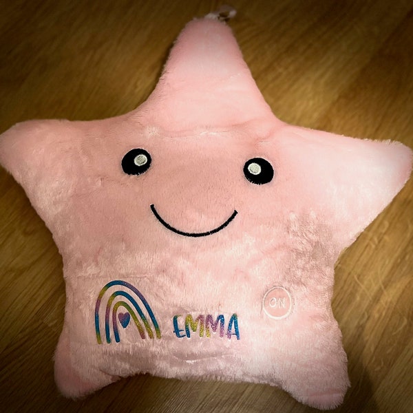 Pink light up monogram star pillow with personalized