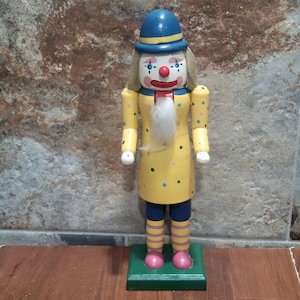 VTG Atico Wooden Clown Nutcracker Blue Hat Yellow Dotted Coat Striped Legs Green Base