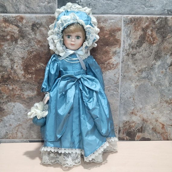 Vintage Porcelain Doll Green Eyes Blue Satin Dress White Lace Trim