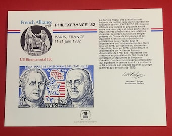 May include: A commemorative souvenir card for the 1982 Philexfrance exhibition featuring a 13c US stamp and a 1.20 French stamp. The card displays portraits of Vergennes and Benjamin Franklin, historical text, and the signature of William F. Bolger.