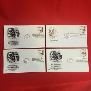 May include: Four white envelopes with stamps and illustrations commemorating the 50th Anniversary of The Seeing Eye, Guide Dogs for the Blind. Each envelope features a dog and a person, with the text "First Day of Issue" and "Seeing For Me".